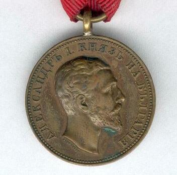Medal for Merit, Type I, in Bronze (with older portrait and stamped "SCHWENZER") Obverse