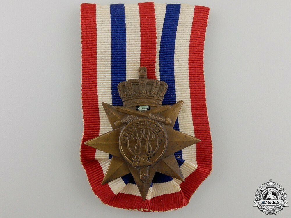 Bronze cross obverse 12