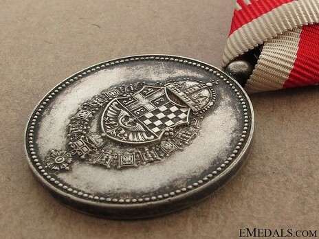 Medal for Meritorious Service to the King, IV Class Obverse