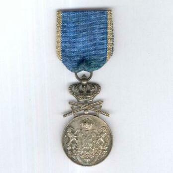 Faithful Service Medal, Type II, II Class (with swords) Obverse