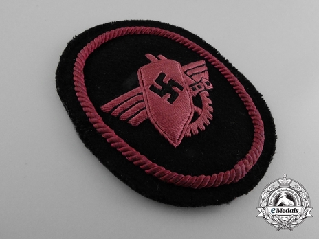 Werkschutz Sleeve Insignia (crimson version) Obverse
