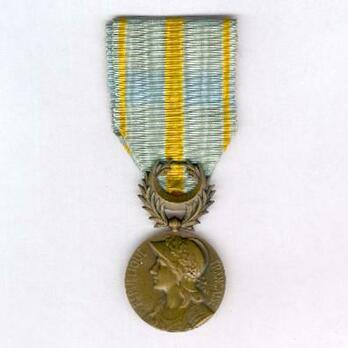 Bronze Medal (stamped "GEORGES LEMAIRE," "E M LINDAUER") Obverse
