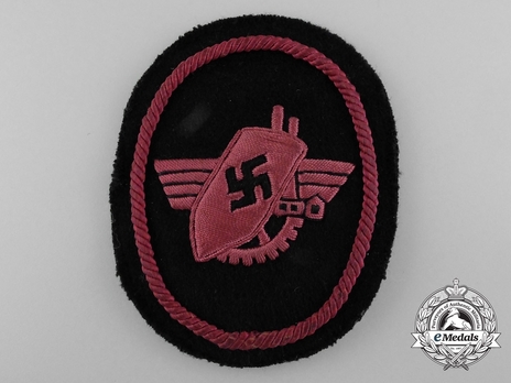 Werkschutz Sleeve Insignia (crimson version) Obverse